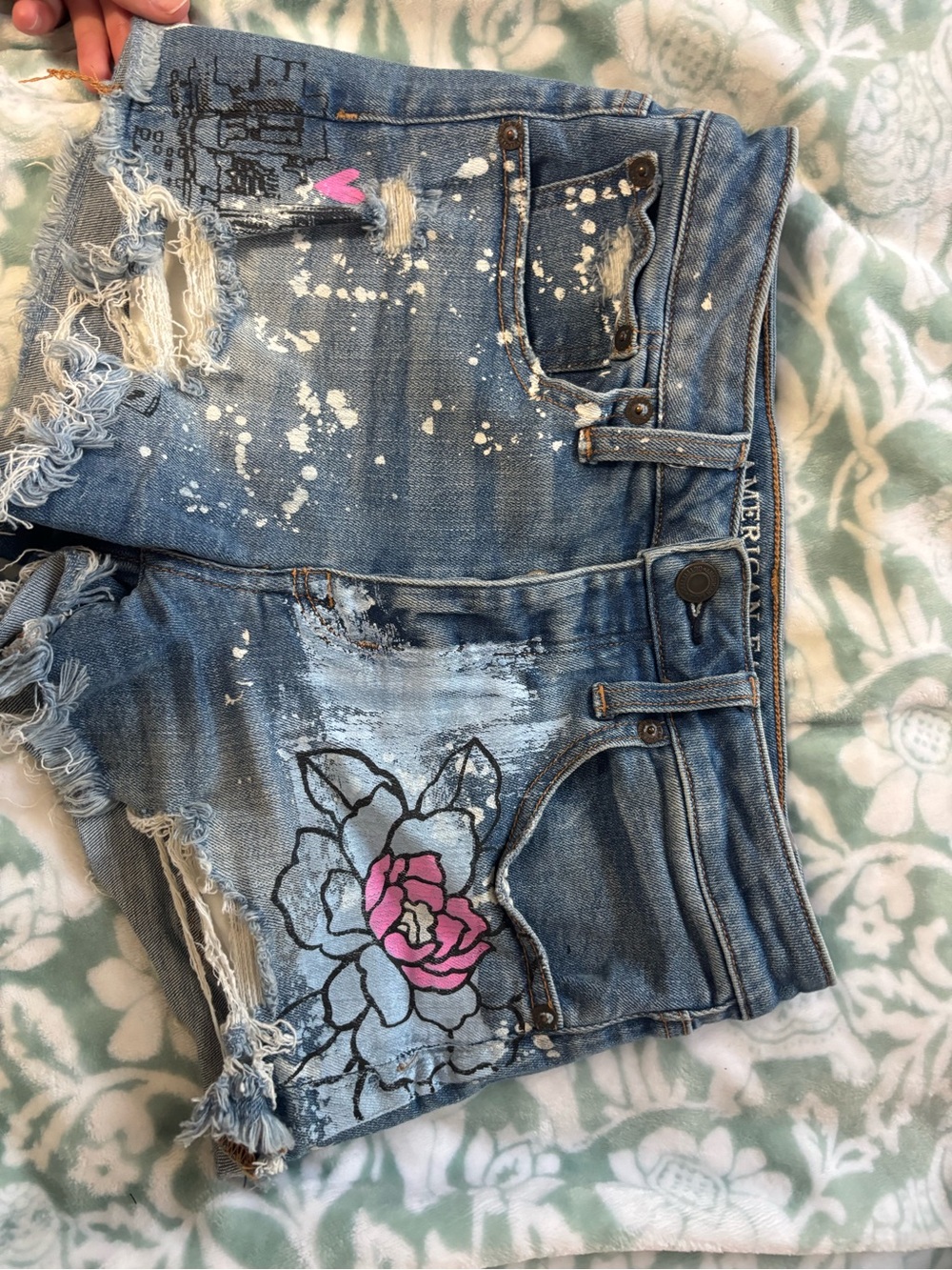 American Eagle Outfitters Distressed Blue Denim Shorts with Pink Floral Accent